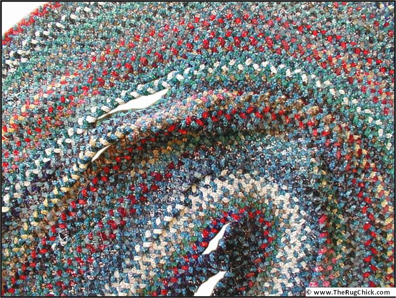 Braided rug coming unraveled.