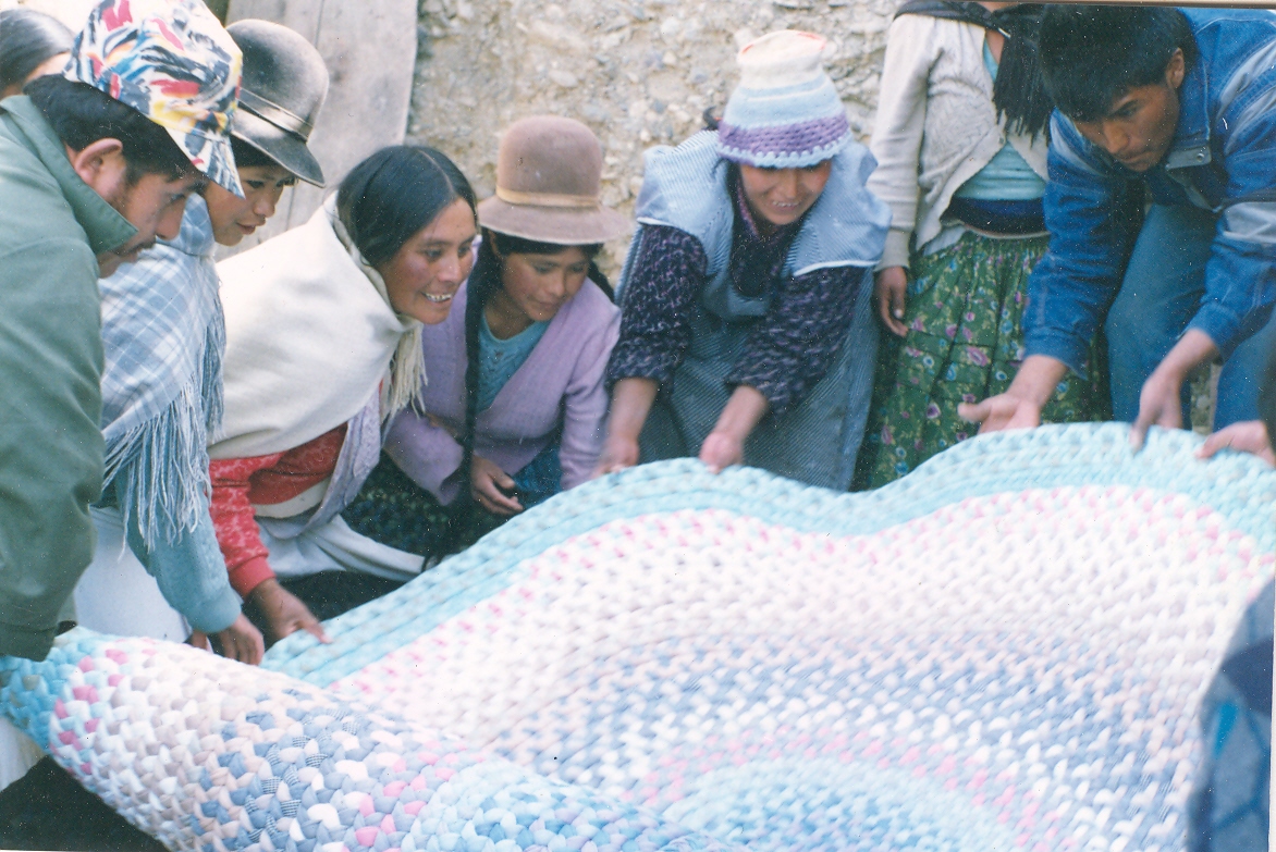 Bolivian cholitas admiring their work